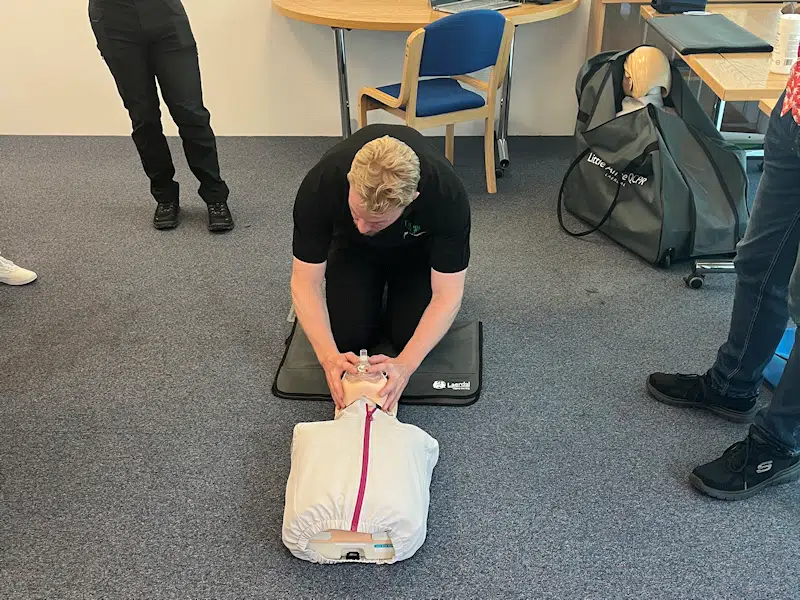 Gus Wood of GHW Training demonstrating first aid skills.