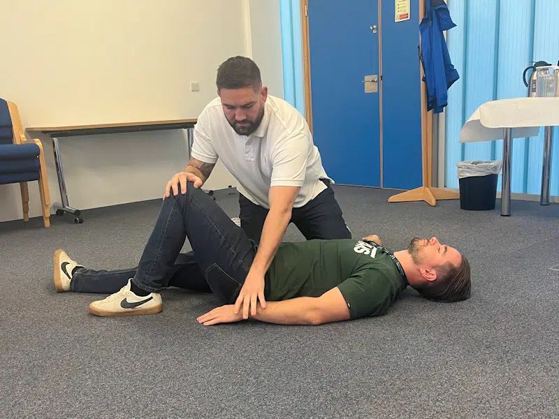 Delegate on GHW Training course practicing first aid training.